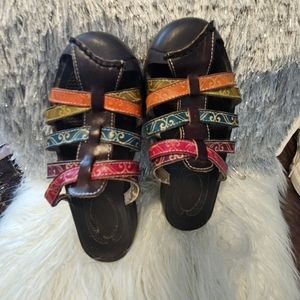 Gently worn corky brand leather sandals with included toe